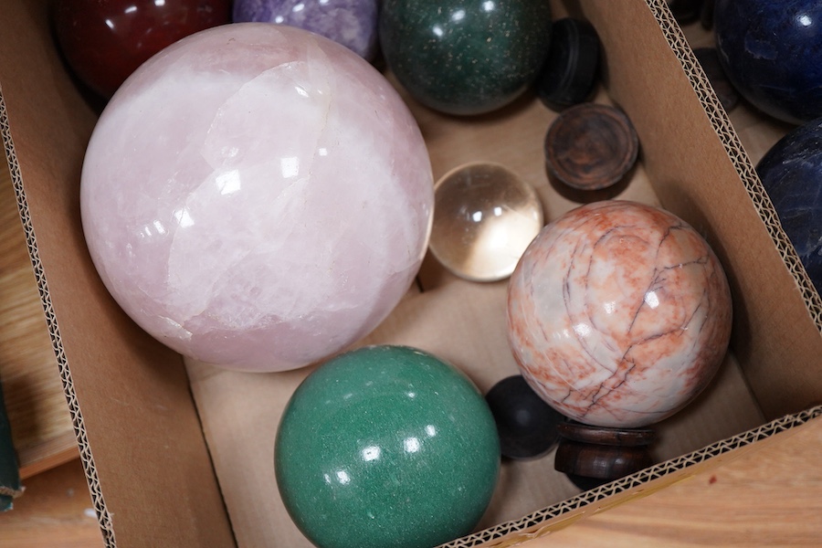Fifteen marble, quartz and other crystal spheres of various diameters, the largest approx 14cm diameter, and an amethyst geode